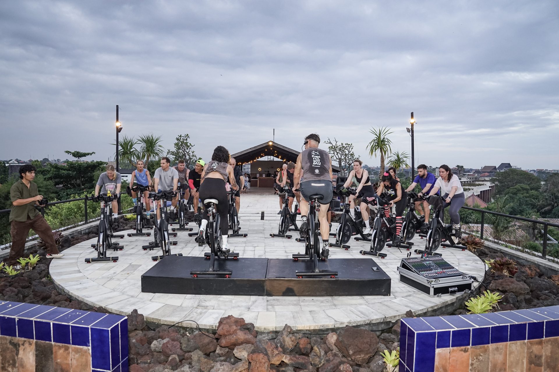 Heartbeat Bali sunset cycling on rooftop in Canggu with ocean view